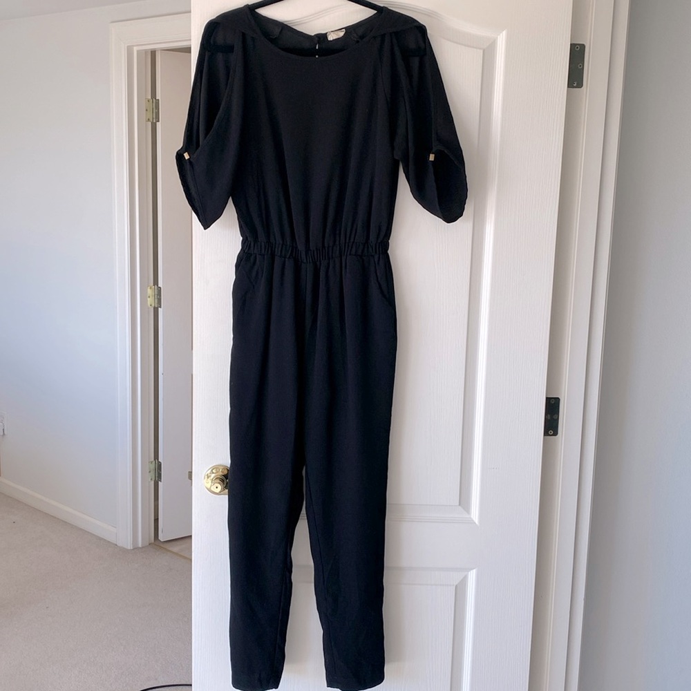 Black jumpsuit with arm slits from boutique brand Teenple